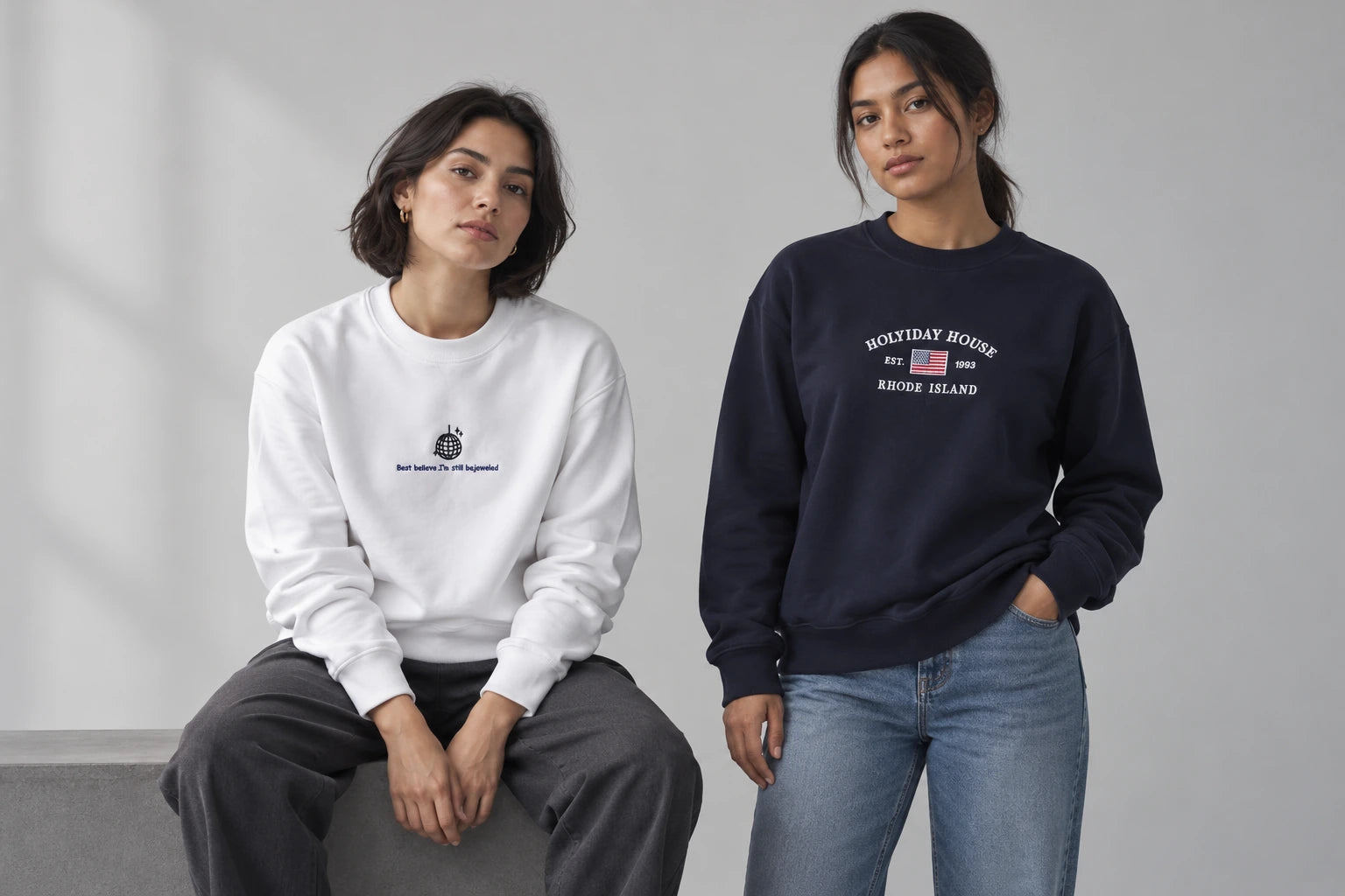 White and navy sweatshirts styled together