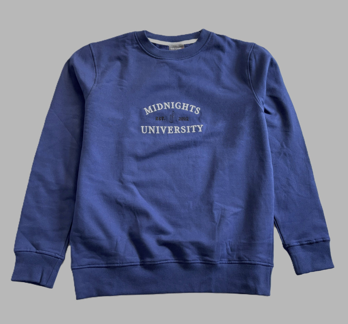 Original Midnights University embroidered sweatshirt photograph